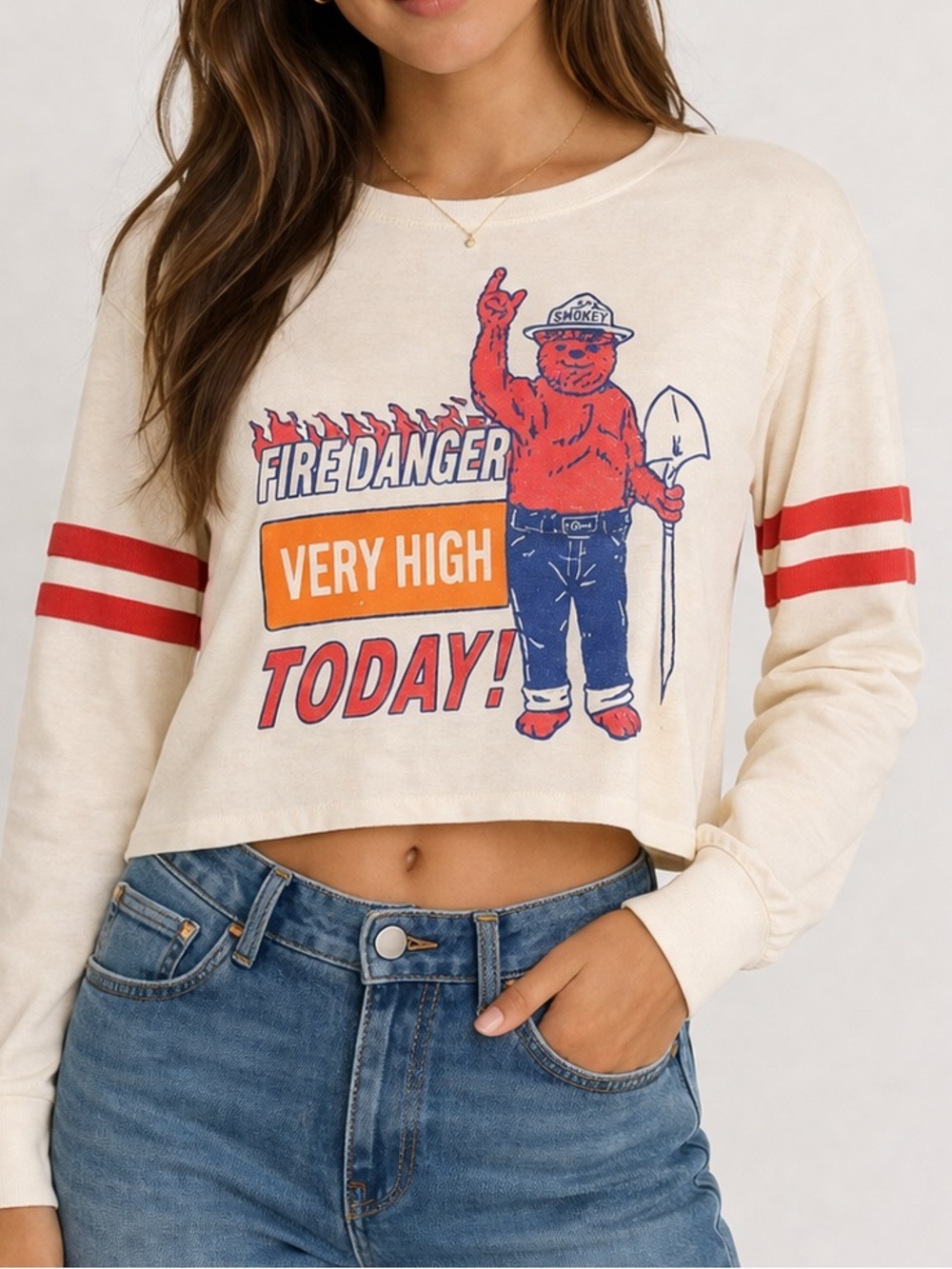 Mighty Fine Cream Long Sleeve Crop Top with Fire Danger Graphic